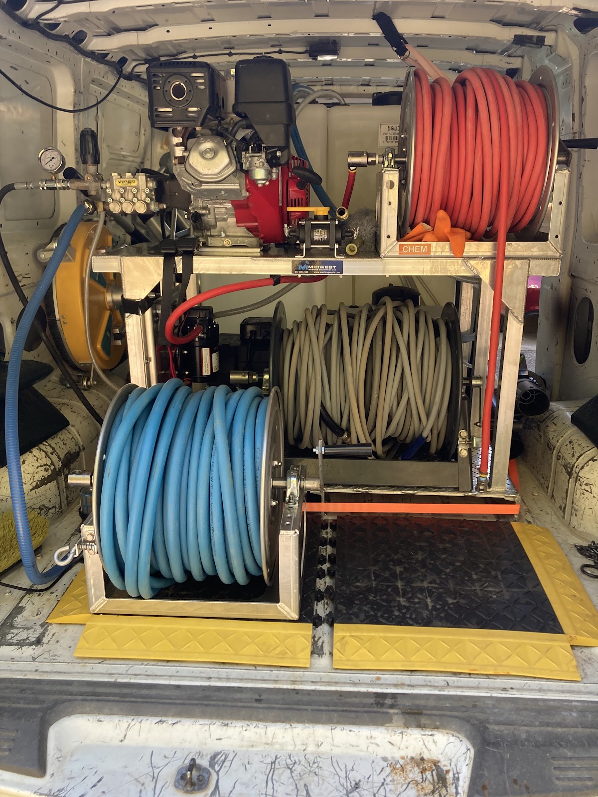 Inside the A&J truck: hose reels and pressure pump